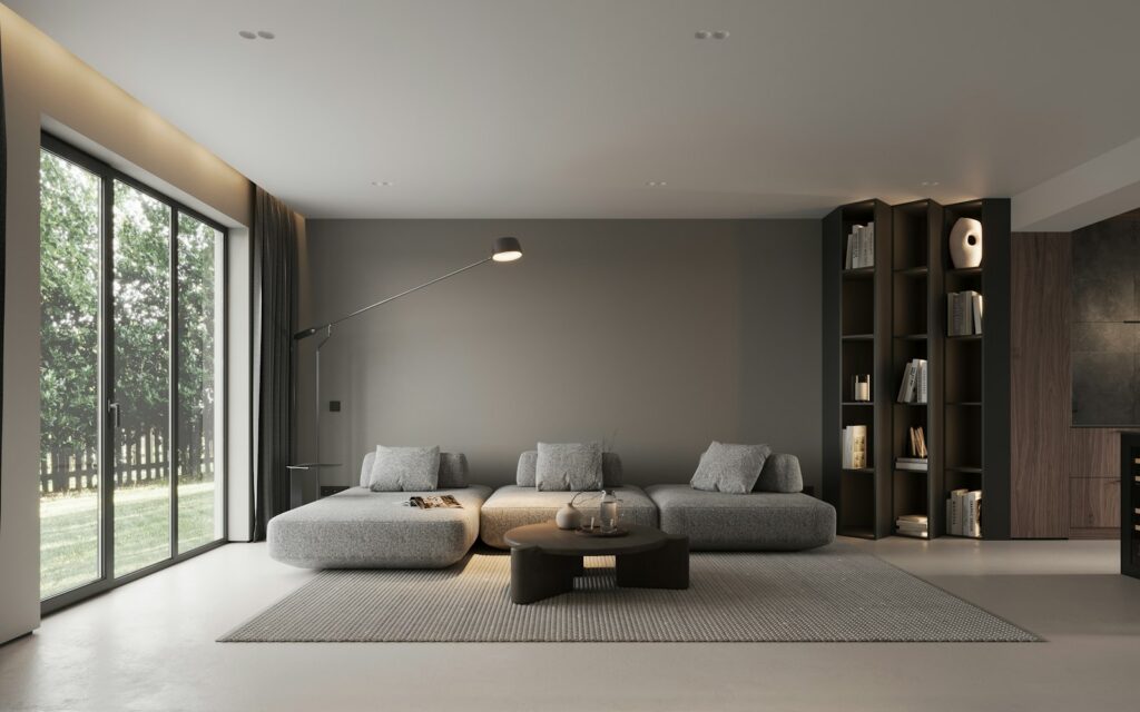 Open-plan living room with floor-to-ceiling garden windows
